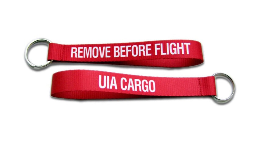Брелок UIA CARGO (червоний) Ленточный брелок Remove before flight